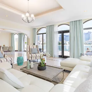 https://four-bedroom-villa-in-palm-jumeirah-by-deluxe-holiday-homes.dubaihotelsoffers.com